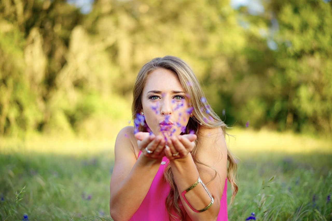 woman, petals, blowing